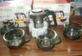 Cafetera y 4 tazas de Vidrio